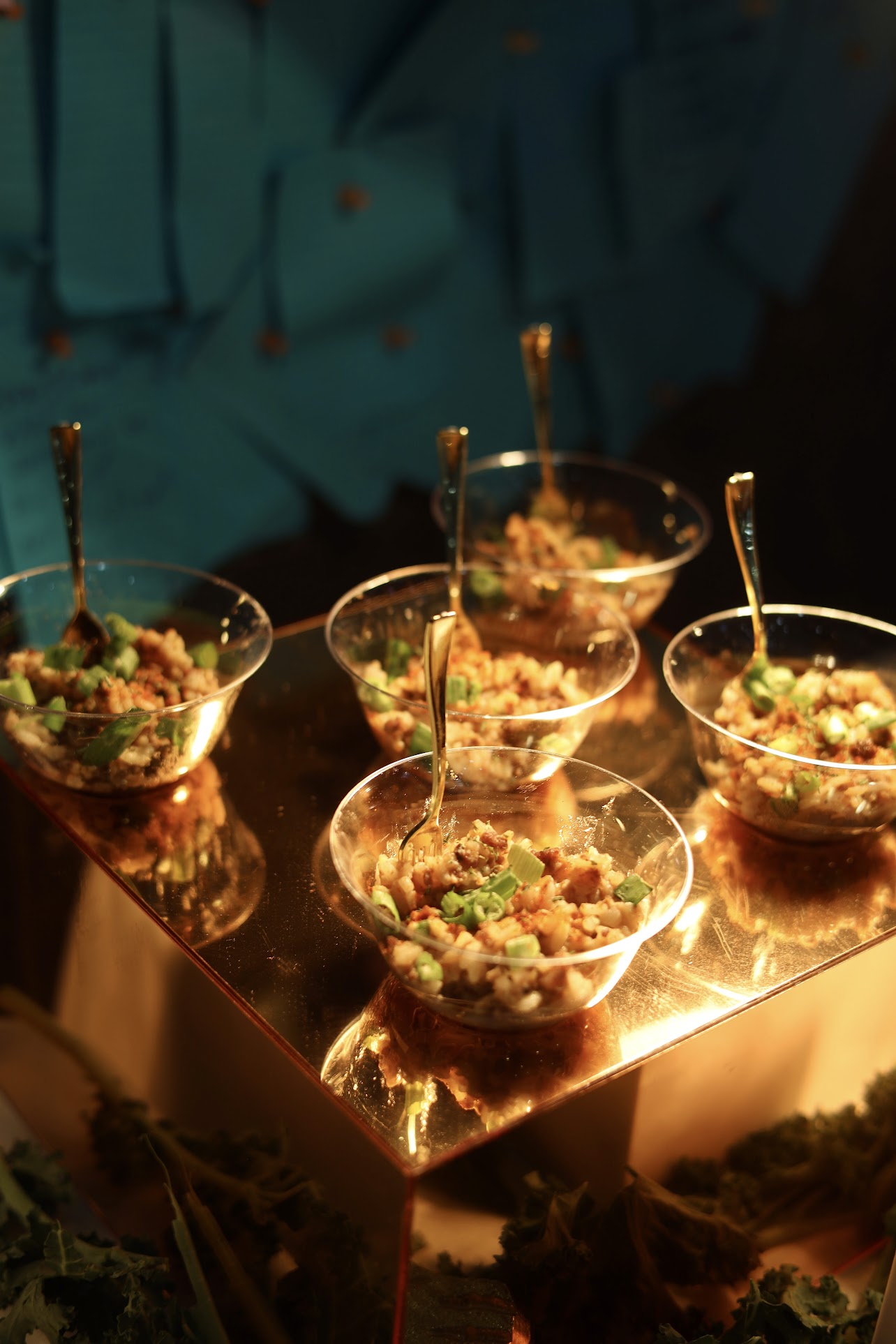 Plated appetizers on a mirrored display